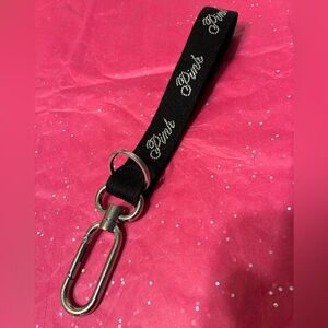 Victoria’s Secret PINK wrist strap with carabineer clip and key ring.